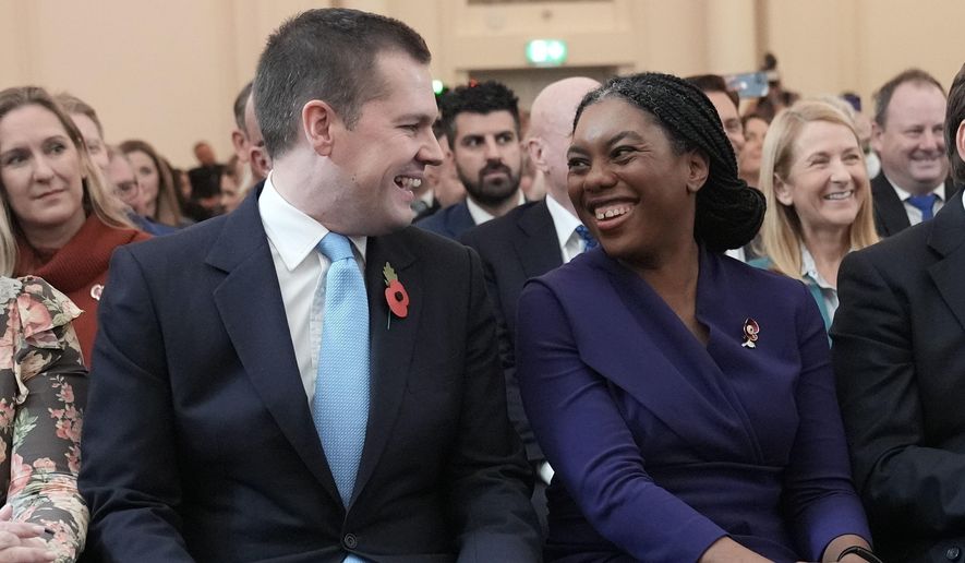 Kemi Badenoch with Robert Jenrick before being announced as the new Conservative Party leader following the vote by party members at 8 Northumberland Avenue in central London, Nov. 3, 2024. (Stefan Rousseau/PA via AP)