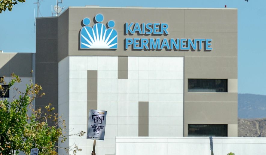 Kaiser Permanente hospital logo is seen during a nationwide strike, on Oct. 4, 2023, in Moreno Valley, Calif. (Watchara Phomicinda/The Orange County Register via AP, File)