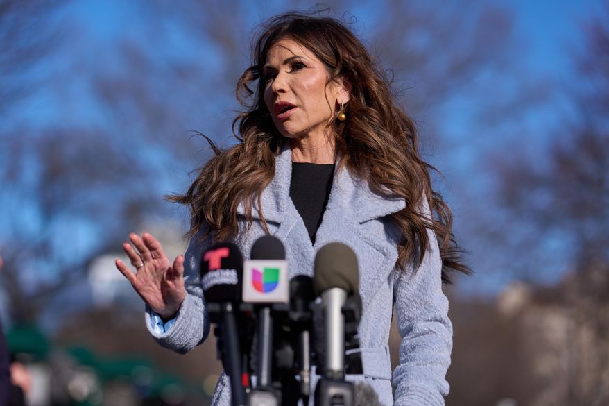 Homeland Security Secretary Kristi Noem speaks with reporters at the White House, Thursday, Jan. 15, 2026, in Washington. (AP Photo/Evan Vucci)
