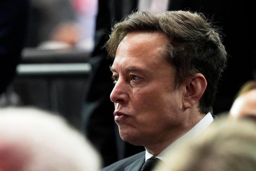 Elon Musk attends a memorial for conservative activist Charlie Kirk, Sunday, Sept. 21, 2025, at State Farm Stadium in Glendale, Ariz. (AP Photo/Julia Demaree Nikhinson, File)