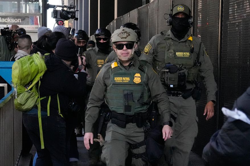 U.S. Customs and Border Patrol agents arrive to escort U.S. Customs and Border Patrol Gregory Bovino from federal court in Chicago, Oct. 28, 2025. (AP Photo/Nam Y. Huh, File)