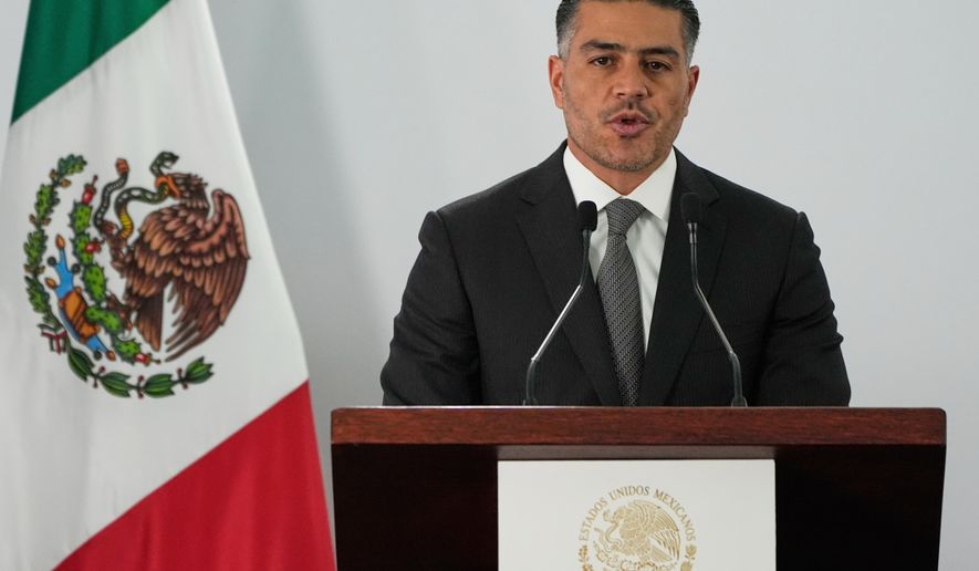 Mexican Security and Citizen Protection Minister Omar Garcia Harfuch attend a news conference in Mexico City, Aug. 13, 2025. (AP Photo/Fernando Llano, File)