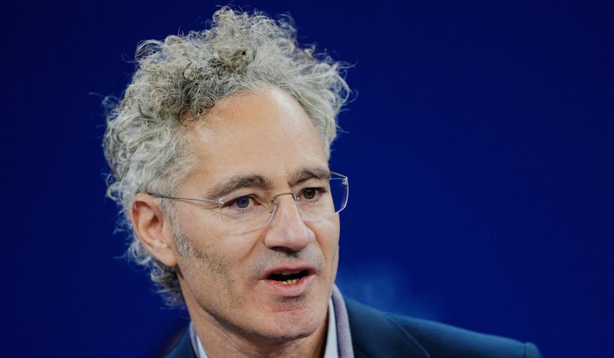 Alex Karp, CEO of the software firm Palantir Technologies speaks during the Annual Meeting of the World Economic Forum in Davos, Switzerland, Tuesday, Jan. 20, 2026. (AP Photo/Markus Schreiber)