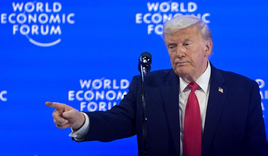 President Donald Trump points during the 56th annual meeting of the World Economic Forum, WEF, in Davos, Switzerland, Wednesday, Jan. 21, 2026. (Gian Ehrenzeller/Keystone via AP)