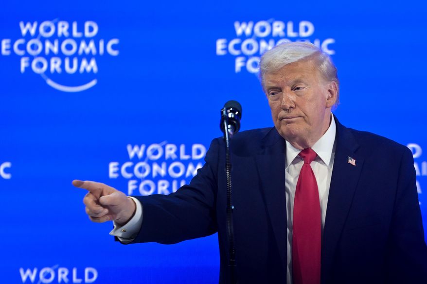 President Donald Trump points during the 56th annual meeting of the World Economic Forum, WEF, in Davos, Switzerland, Wednesday, Jan. 21, 2026. (Gian Ehrenzeller/Keystone via AP)