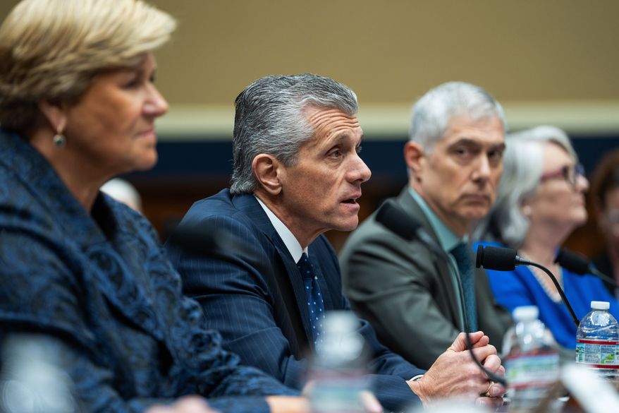Cigna Health Group President, CEO, and Chairman of the Board, David Cordani testifies at a House Committee on Energy and Commerce Subcommittee on Health hearing on lowering health care costs at the Capitol, Thursday, Jan. 22, 2026, in Washington. (AP Photo/Allison Robbert)