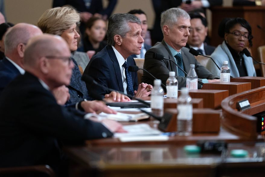 David Cordani, President, CEO, and Chairman of the Board, Cigna Health Group, testifies before the House Committee on Ways and Means hearing with Health Insurance CEOs on Capitol Hill in Washington, Thursday, Jan. 22, 2026. (AP Photo/Jose Luis Magana)