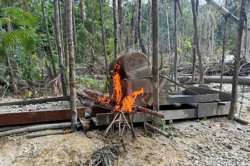 This image provided by Interpol shows an illegal gold mining site on Dec. 18, 2025, in the Upper Takutu-Upper Esequibo region of Guyana. (Interpol via AP)