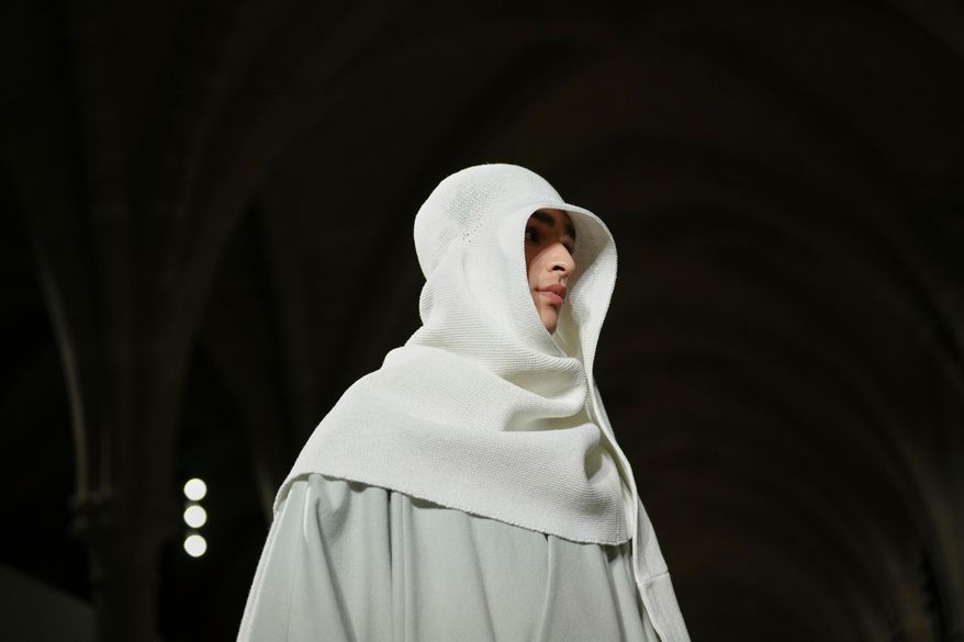 A model wears a creation as part of the Issey Miyake Fall/Winter 2026-2027 Men's collection presented in Paris, Thursday, Jan. 22, 2026. (AP Photo/Aurelien Morissard)