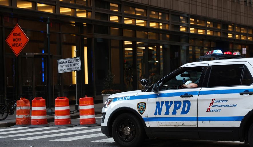 An NYPD cruiser sits at the intersection of a Midtown street closed due to construction, Nov. 7, 2024, in New York. (AP Photo/Heather Khalifa, File)