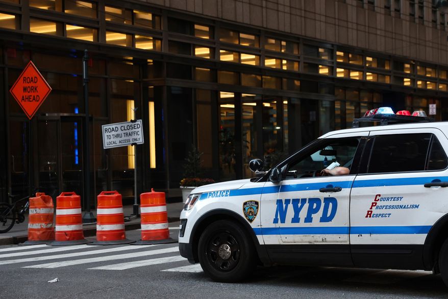 An NYPD cruiser sits at the intersection of a Midtown street closed due to construction, Nov. 7, 2024, in New York. (AP Photo/Heather Khalifa, File)