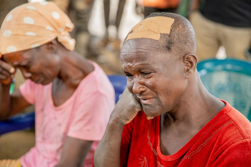 In this photo released by the Kaduna State government, people react during a meeting with Kaduna state Governor. Uba Sani, after gunmen attack in Kurmin Wali, northwest Nigeria, Wednesday, Jan. 21, 2026. (Kaduna State Government via AP)