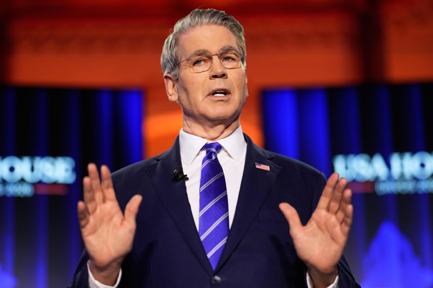 US Treasury Secretary Scott Bessent speaks at the USA house during the Annual Meeting of the World Economic Forum in Davos, Switzerland, Wednesday, Jan. 21, 2026. (AP Photo/Markus Schreiber)