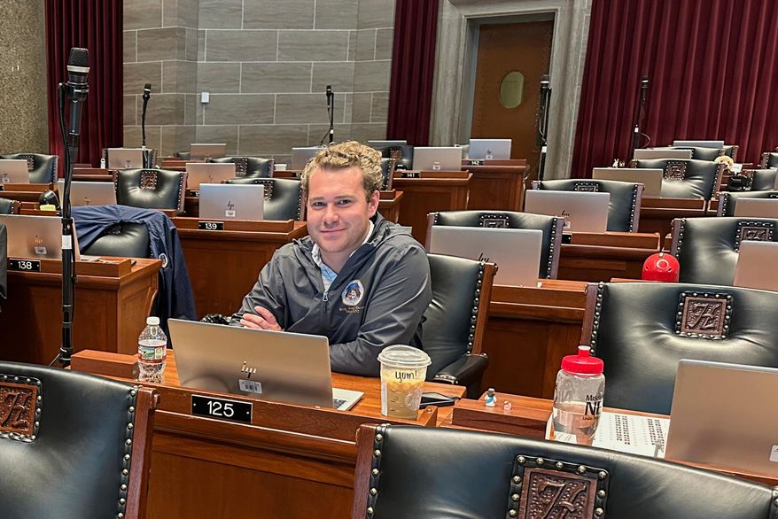 FILE - Missouri state Rep. Jeremy Dean, D-Springfield, glances up from his computer in the Missouri House chamber during a special legislation session, Sept. 8, 2025 in Jefferson City, Mo. (AP Photo/David A. Lieb, File)