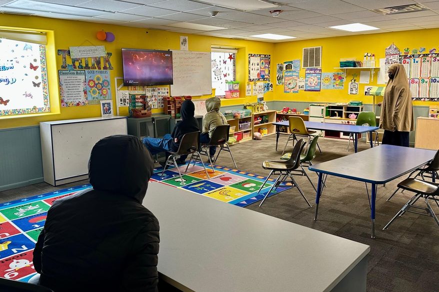 FILE - Children watch television at ABC Learning Center in Minneapolis, Minn., Dec. 31, 2025. (AP Photo/Mark Vancleave, File)