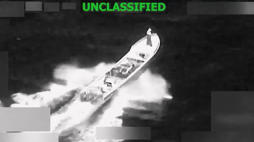 This image from video provided by U.S. South Command, shows a vessel accused of trafficking drugs in the eastern Pacific Ocean shortly before it was destroyed by the U.S. military, killing two and injuring one, on Jan. 23, 2026. (U.S. Southern Command via AP)