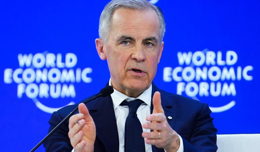 FILE - Canada Prime Minister Mark Carney delivers a speech at the World Economic Forum in Davos, Switzerland on Tuesday, Jan. 20, 2026. (Sean Kilpatrick/The Canadian Press via AP, File)