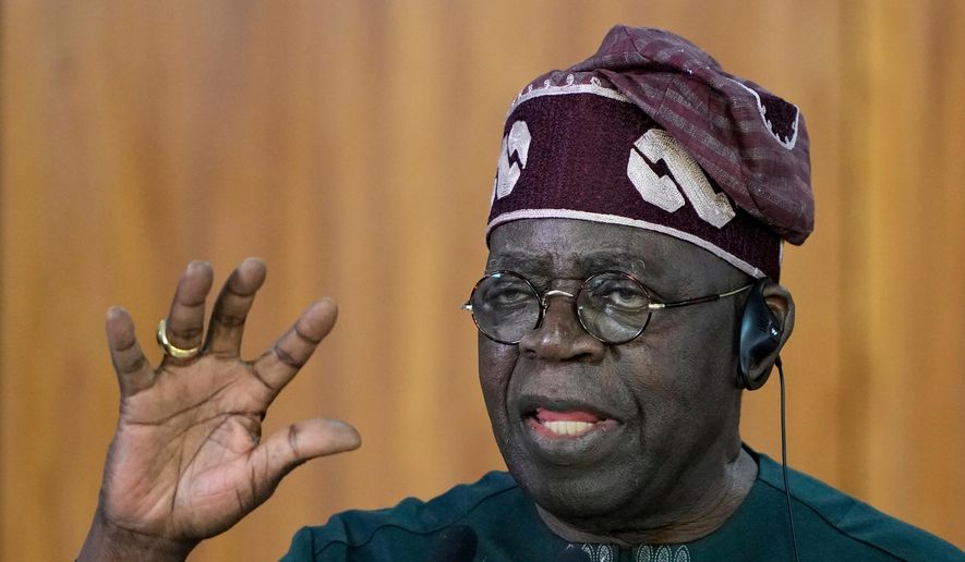 Nigeria's President Bola Tinubu gives a joint statement with Brazil's President Luiz Inacio Lula da Silva, at the Planalto presidential palace, in Brasilia, Brazil, Aug. 25, 2025. (AP Photo/Eraldo Peres, File)
