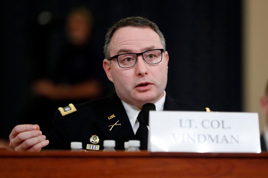 National Security Council aide Lt. Col. Alexander Vindman testifies before the House Intelligence Committee on Capitol Hill in Washington, Nov. 19, 2019, during a public impeachment hearing of President Donald Trump's efforts to tie U.S. aid for Ukraine to investigations of his political opponents. (AP Photo/Andrew Harnik) **FILE**