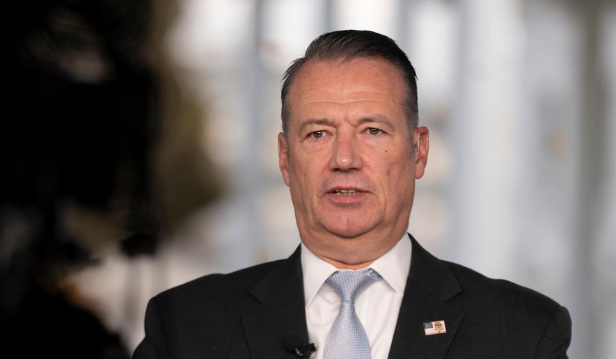Todd Lyons, acting director of the U.S. Immigration and Customs. Enforcement (ICE), is interviewed on TV on the White House grounds, Monday, Nov. 3, 2025, in Washington. (AP Photo/Manuel Balce Ceneta, File)