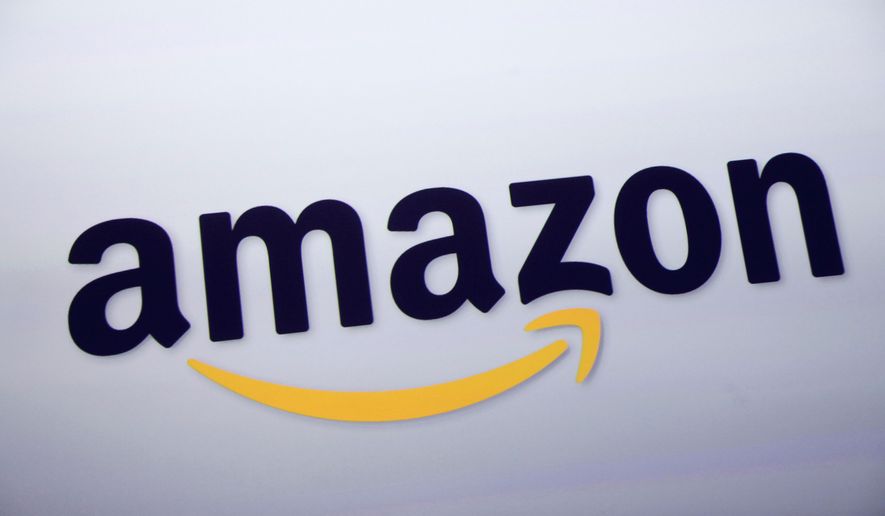 FILE - The Amazon logo is displayed at a news conference in New York on Sept. 28, 2011. (AP Photo/Mark Lennihan, File)
