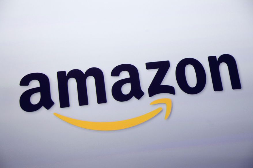 FILE - The Amazon logo is displayed at a news conference in New York on Sept. 28, 2011. (AP Photo/Mark Lennihan, File)