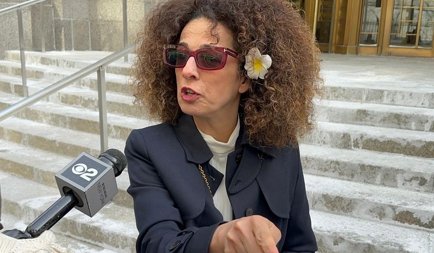 Iranian-American journalist Masih Alinejad speaks outside Manhattan federal court after the sentencing of a man who admitted to agreeing to try to kill her on behalf of the Iranian government Wednesday, Jan. 28, 2026, in New York. (AP Photo/Larry Neumeister)
