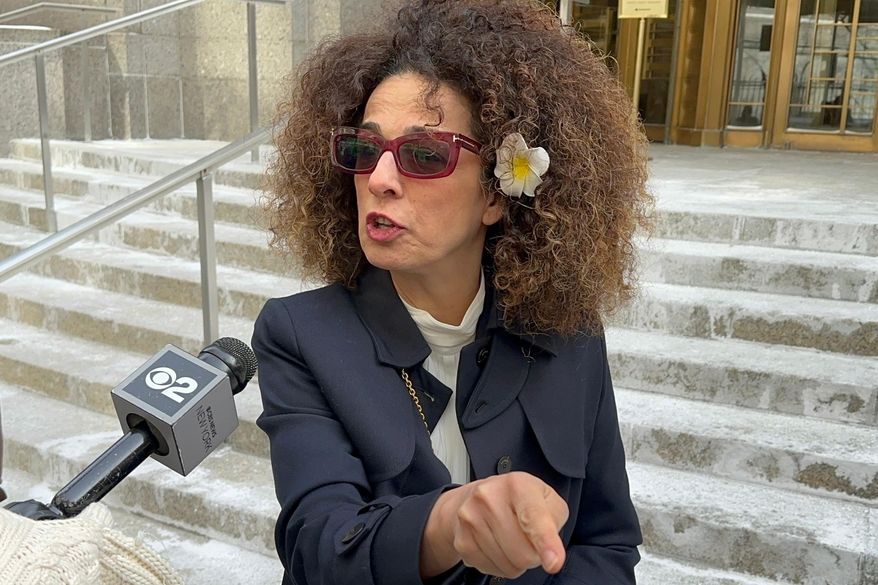Iranian-American journalist Masih Alinejad speaks outside Manhattan federal court after the sentencing of a man who admitted to agreeing to try to kill her on behalf of the Iranian government Wednesday, Jan. 28, 2026, in New York. (AP Photo/Larry Neumeister)