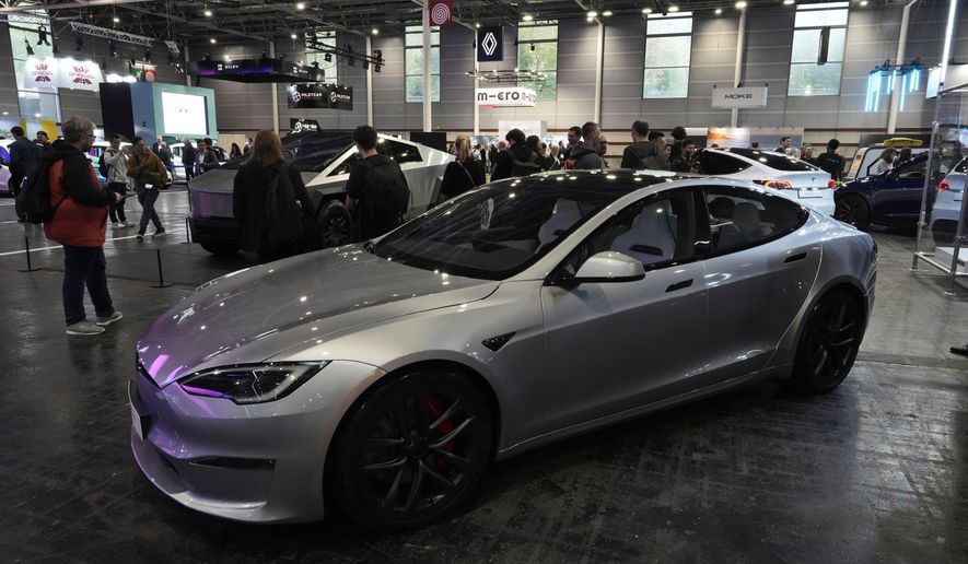 A Tesla Model S is pictured at the Paris Auto Show, in Paris, Oct. 14, 2024. (AP Photo/Michel Euler, File)