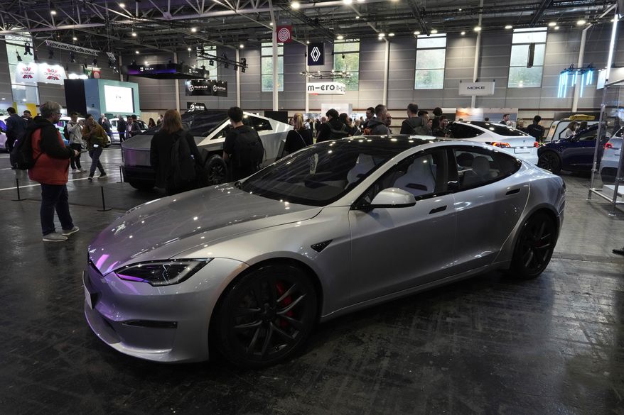 A Tesla Model S is pictured at the Paris Auto Show, in Paris, Oct. 14, 2024. (AP Photo/Michel Euler, File)