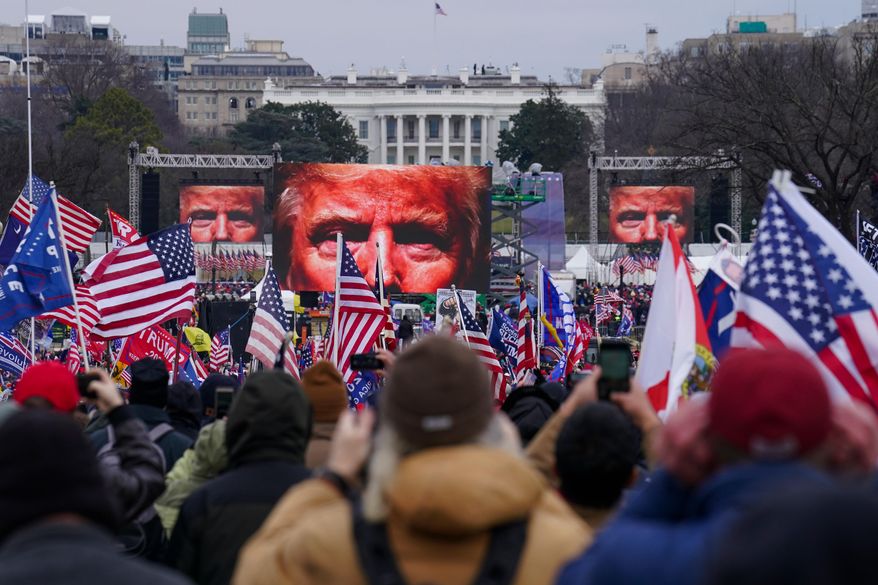 FILE - Supporters of President Donald Trump participate in a rally Jan. 6, 2021, in Washington. (AP Photo/John Minchillo, File)