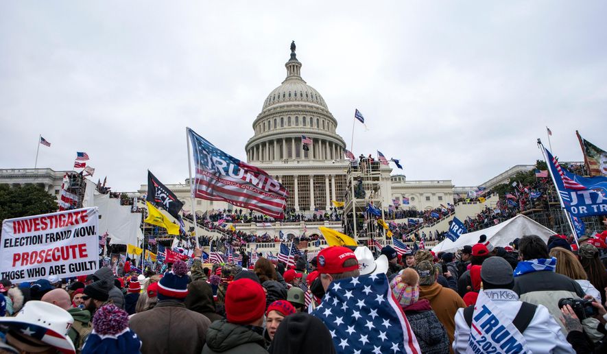 Rioters loyal to President Donald Trump rally at the U.S. Capitol in Washington on Jan. 6, 2021. (AP Photo/Jose Luis Magana, File)