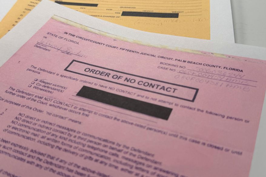 An email that was included in the U.S. Department of Justice release of the Jeffrey Epstein files is photographed Friday, Jan. 30, 2026, and shows a 2009 order of no contact in Palm Beach, Fla. (AP Photo/Jon Elswick)