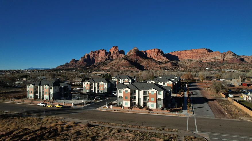 A modern apartment building is shown Friday, Dec. 5, 2025, in Colorado City, Ariz. (AP Photo/Rick Bowmer)