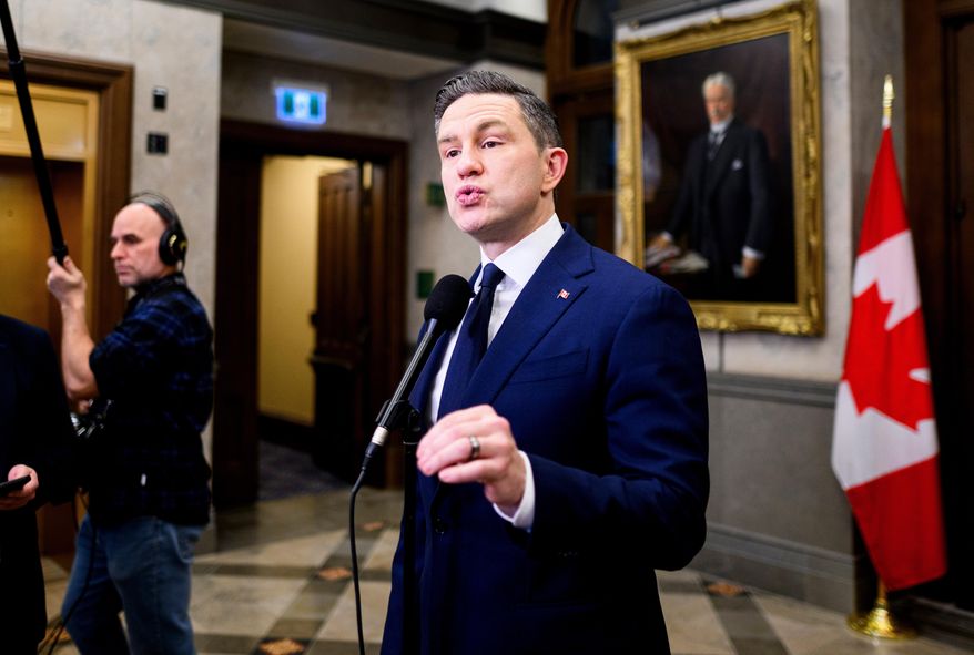 Conservative Leader Pierre Poilievre speaks in the foyer of the House of Commons on Parliament Hill in Ottawa, Thursday, Dec. 11, 2025. (Spencer Colby/The Canadian Press via AP, File