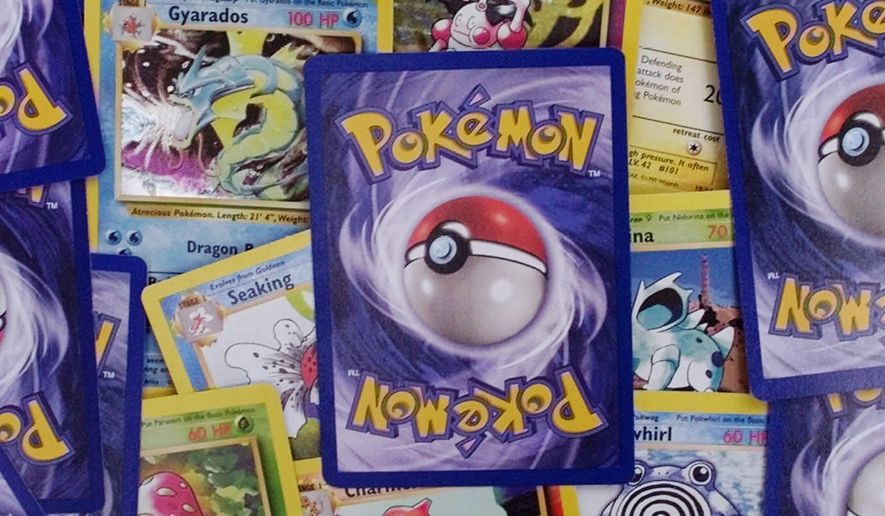 FILE- In this Sept. 8, 1999 file photo, a selection of Pokemon trading cards are displayed in Scituate, Mass. (AP Photo/Charles Krupa, file)