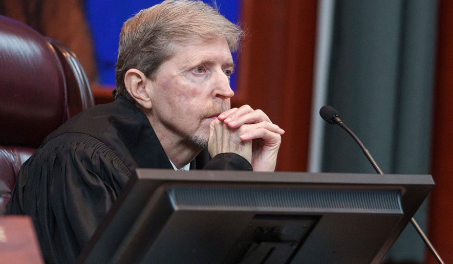 Utah Supreme Court Chief Justice Matthew B. Durrant listens to oral arguments for a case challenging the state's congressional districts before the Utah Supreme Court in Salt Lake City, Tuesday, July 11, 2023. (Leah Hogsten/The Salt Lake Tribune via AP, Pool, File)