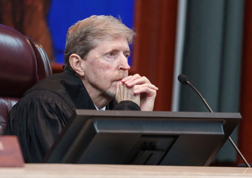 Utah Supreme Court Chief Justice Matthew B. Durrant listens to oral arguments for a case challenging the state's congressional districts before the Utah Supreme Court in Salt Lake City, Tuesday, July 11, 2023. (Leah Hogsten/The Salt Lake Tribune via AP, Pool, File)