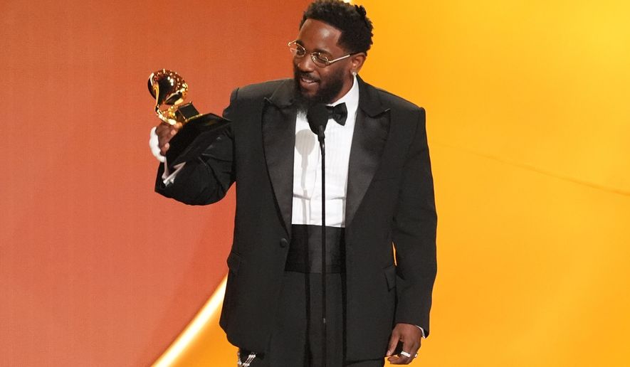 Kendrick Lamar accepts the award for best rap album for "GNX" during the 68th annual Grammy Awards on Sunday, Feb. 1, 2026, in Los Angeles. (AP Photo/Chris Pizzello)