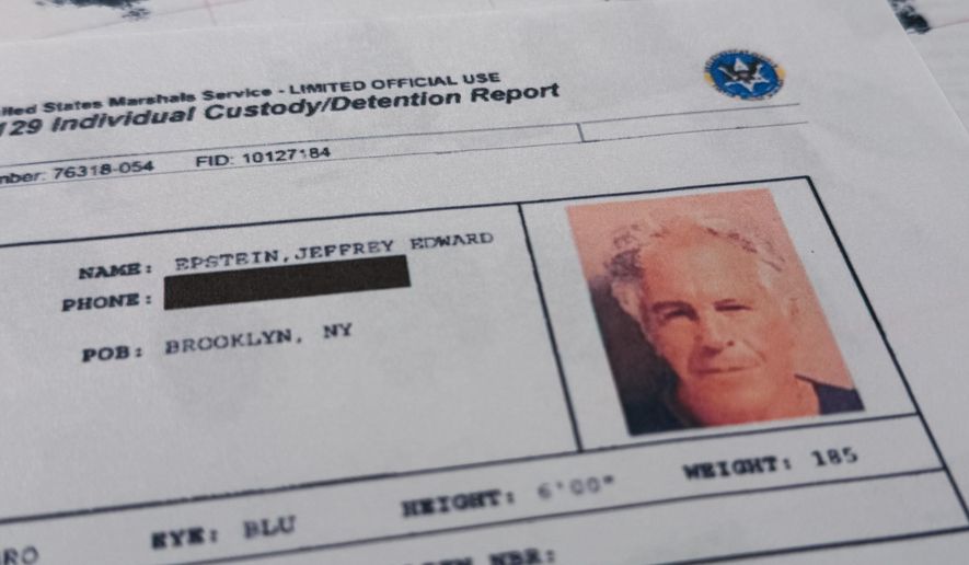A document that was included in the U.S. Department of Justice release of the Jeffrey Epstein files is photographed Sunday, Feb. 1, 2026, shows the report when Epstein was taken into custody on July 6, 2019. (AP Photo/Jon Elswick)