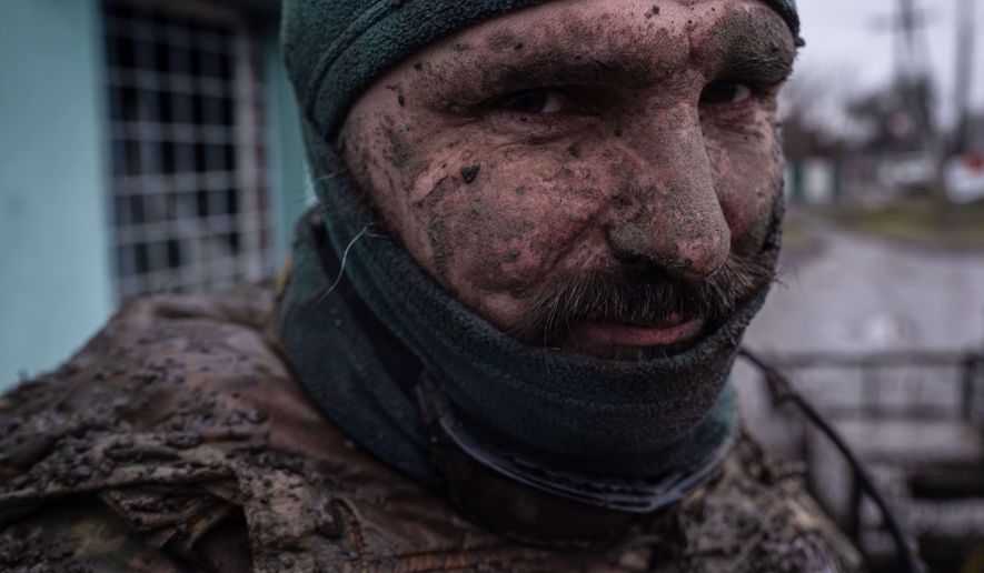 In this photo provided by Ukraine's 93rd Kholodnyi Yar Separate Mechanized Brigade press service, a serviceman poses for a photographer in Donetsk region, Ukraine, Saturday, Jan. 31, 2026. (Iryna Rybakova/Ukraine's 93rd Mechanized Brigade via AP)