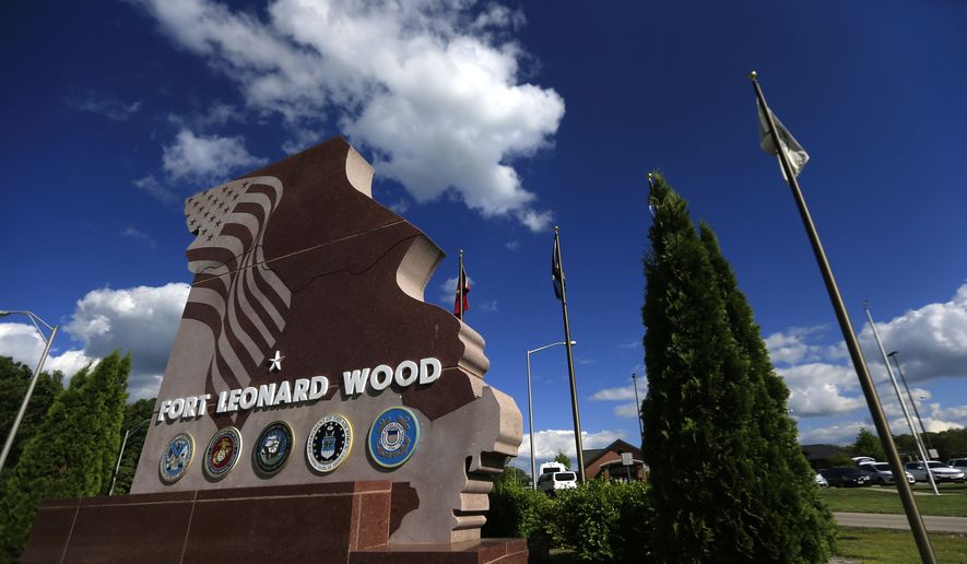 The main gate at Fort Leonard Wood, Mo., is shown on Tuesday, May 3, 2016. (AP Photo/Orlin Wagner) ** FILE **