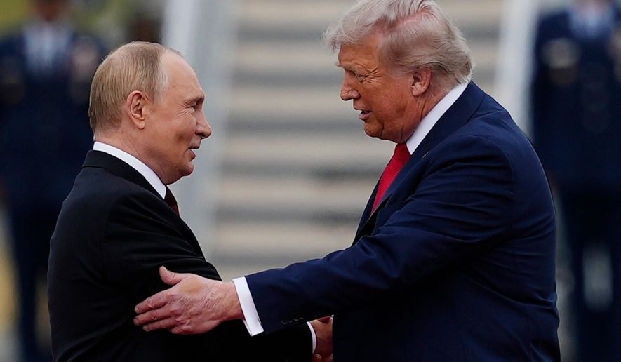 U.S. President Donald Trump greets Russian President Vladimir Putin, Aug. 15, 2025, at Joint Base Elmendorf-Richardson, Alaska. (AP Photo/Julia Demaree Nikhinson, File)