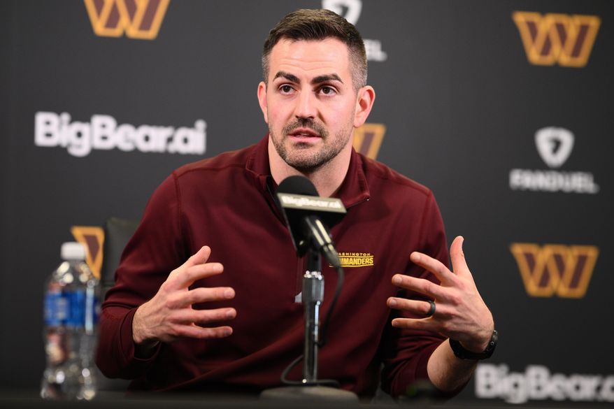 Washington Commanders offensive coordinator David Blough speaks to the media during an NFL football press conference, Tuesday, Feb. 10, 2026, in Ashburn, Va. (AP Photo/Nick Wass)