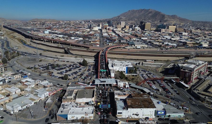 Cars cross the "Paso del Norte" International Bridge at the U.S.-Mexico border between Ciudad Juarez, Mexico, bottom, and El Paso, Texas, top, Wednesday Feb. 11, 2026. (AP Photo/Christian Chavez) ** FILE **