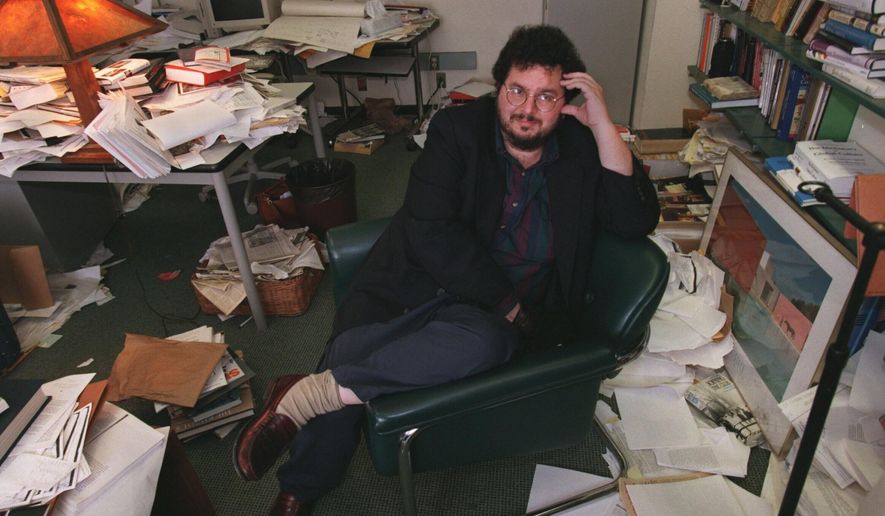 Professor David Gelernter sits in his office at Yale University in New Haven, Conn., on Aug. 28, 1997. (Brad Clift/Hartford Courant via AP)