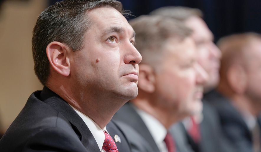 Montana Attorney General Austin Knudsen, left, testifies during a House Committee on Homeland Security hearing on Capitol Hill, Jan. 10, 2024, in Washington. (AP Photo/Mariam Zuhaib, File)