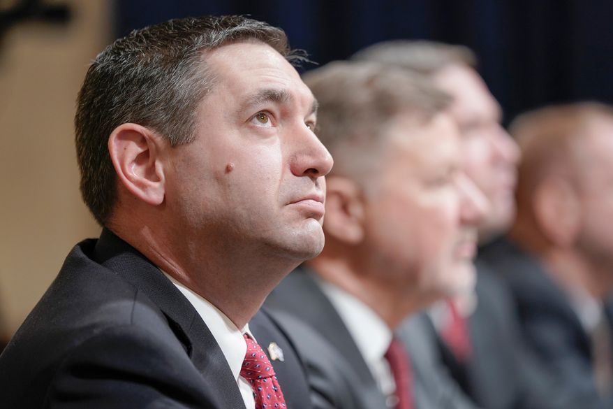 Montana Attorney General Austin Knudsen, left, testifies during a House Committee on Homeland Security hearing on Capitol Hill, Jan. 10, 2024, in Washington. (AP Photo/Mariam Zuhaib, File)