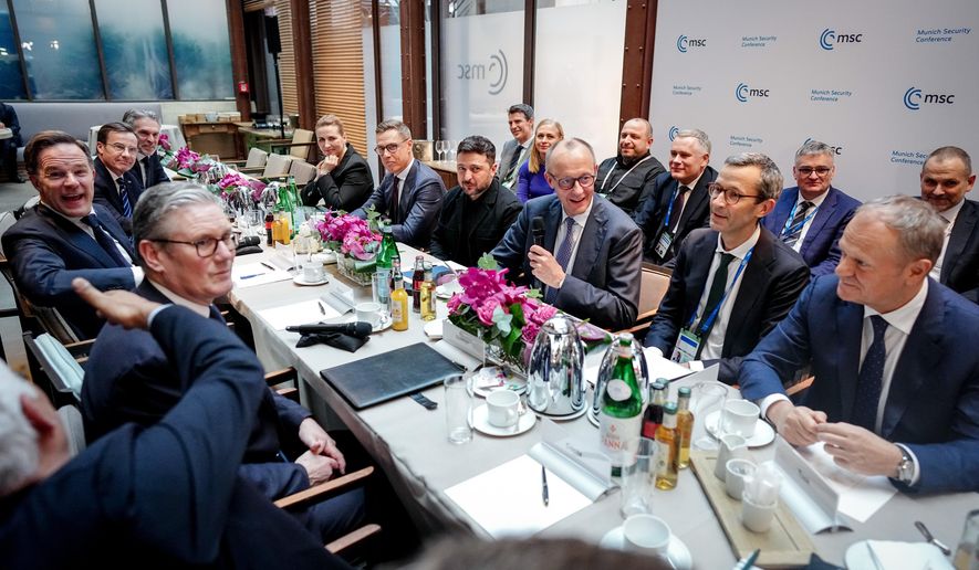 From left, Secretary General of NATO Mark Rutte, Britain's Prime Minister Keir Starmer, Prime Minister of Sweden Ulf Kristersson, Prime Minister of the Netherlands Dick Schoof, Prime Minister of Denmark Mette Frederiksen, President of Finland Alexander Stubb, Ukrainian President Volodymyr Zelenskyy, German Chancellor Friedrich Merz, Günter Sautter Foreign and Security Policy Advisor to the Chancellor, Prime Minister of Poland attend a meeting at the Munich Security Conference in Munich, Germany, Friday Feb. 13, 2026. (Kay Nietfeld/Pool via AP)