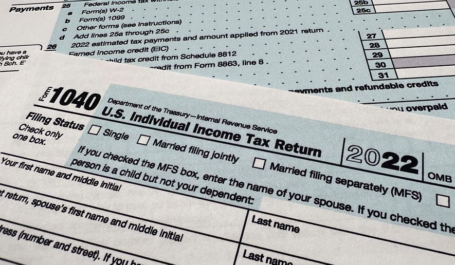 The Internal Revenue Service 1040 tax form for 2022 is seen on April 17, 2023. (AP Photo/Jon Elswick, File)